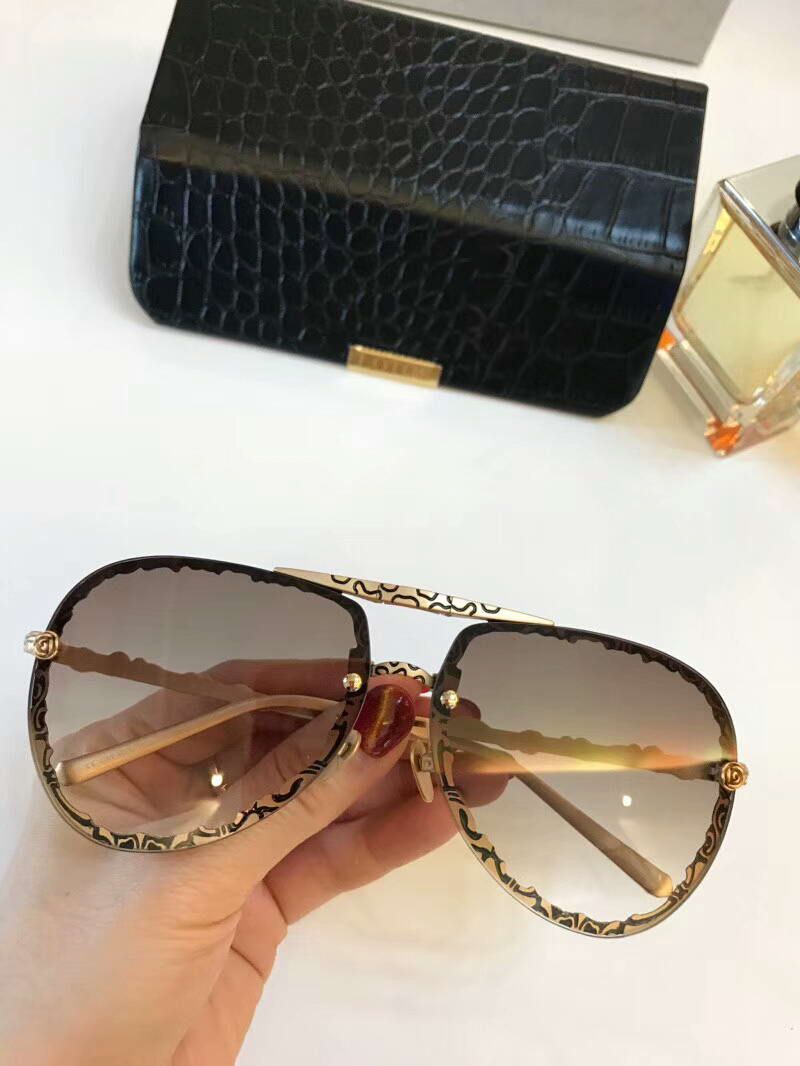 gafas de sol doradas mujer