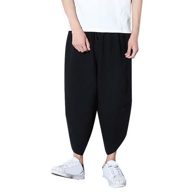 pantaloni larghi neri uomo