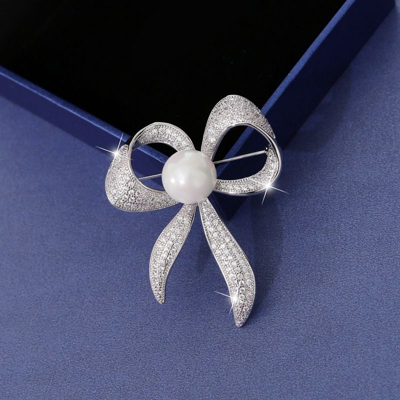 silver brooches