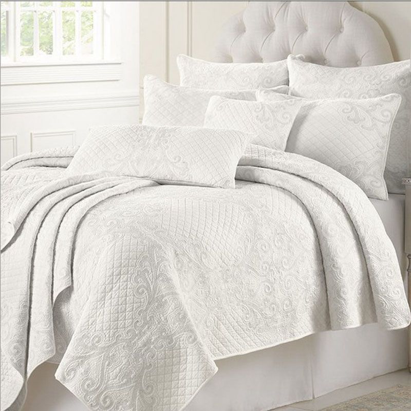 white embroidered bedding set