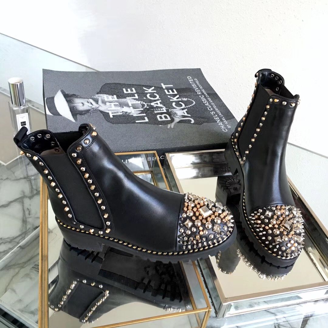boots with spikes on bottom