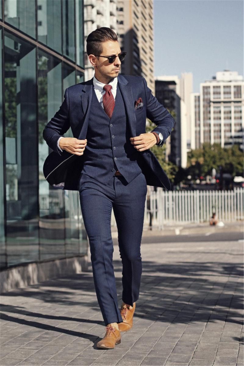 men in navy suits