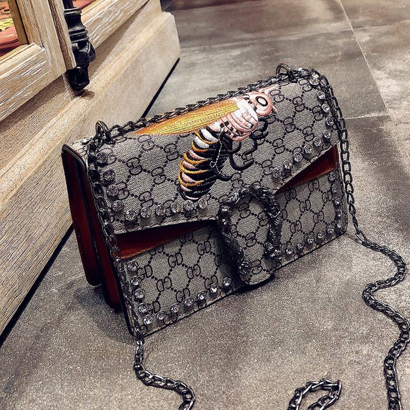 red and black designer bolsa