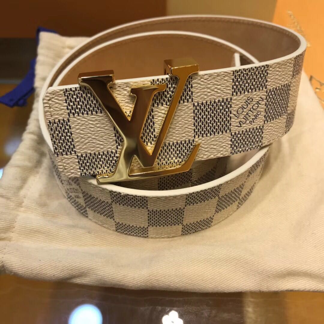 white and gold designer belt