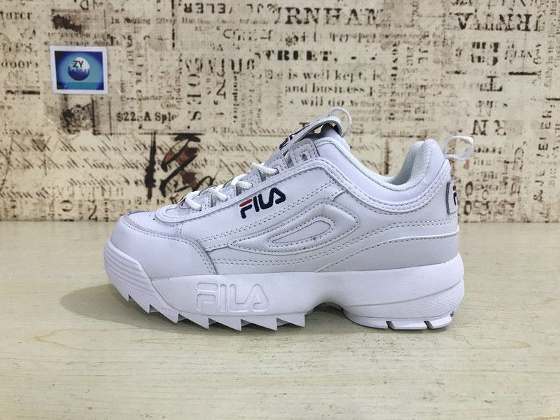 green and white fila shoes