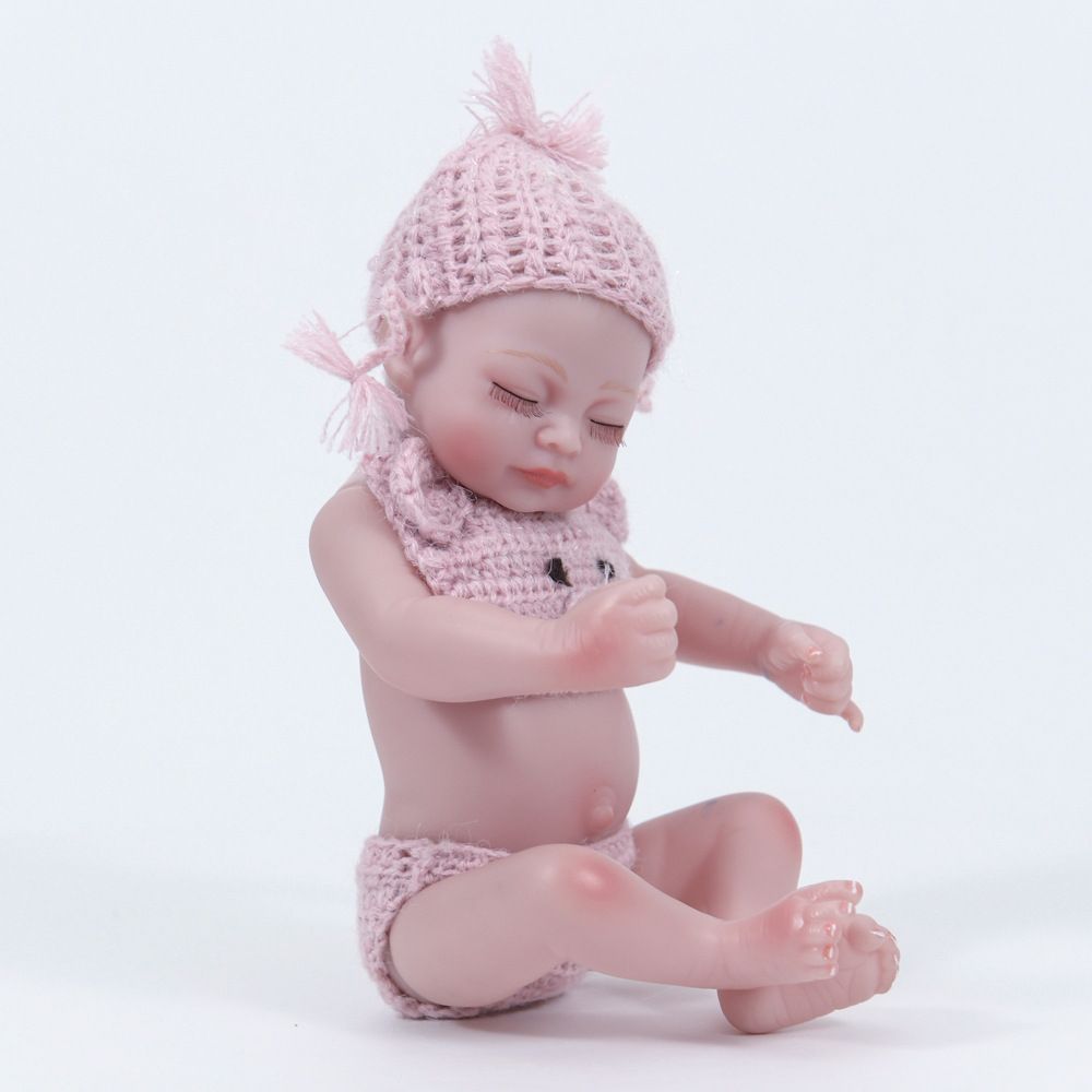 miniature newborn baby dolls