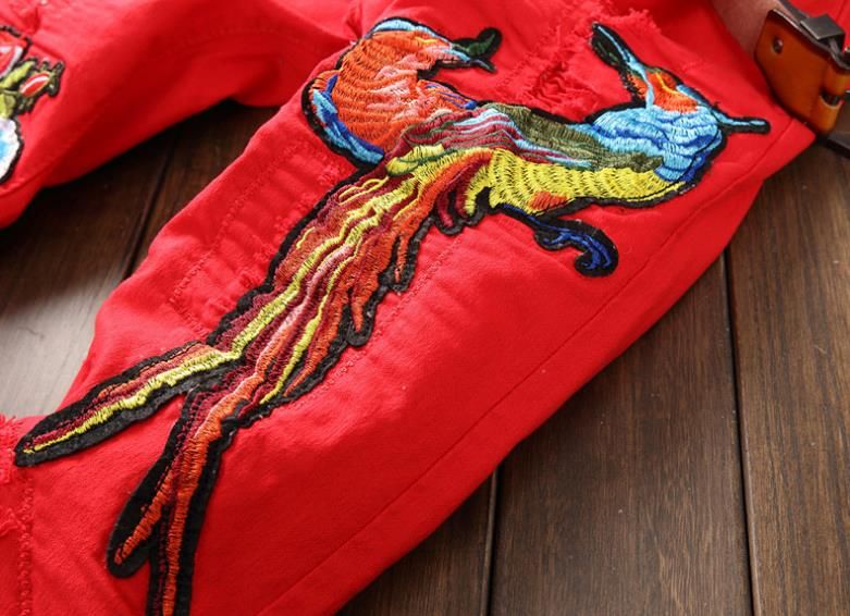 red ripped pants