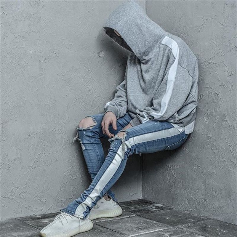distressed jeans with side stripe