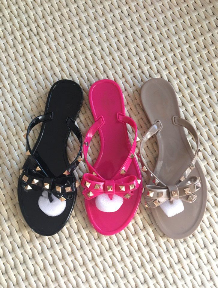 black plastic flip flops