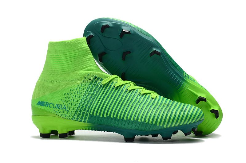 green and black soccer cleats