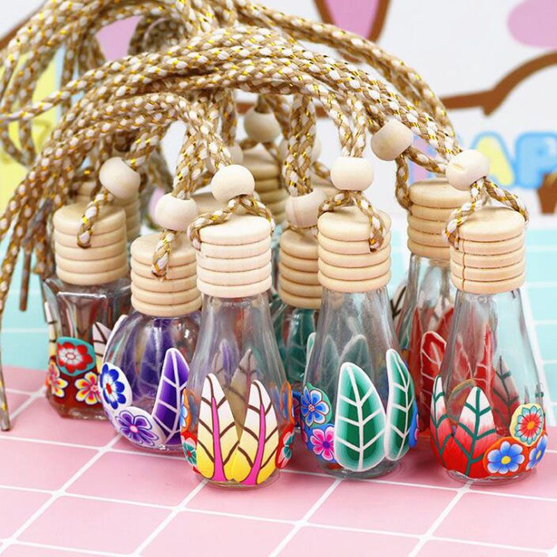 8 15ml Polymer Clay Glass Essence Oil Diffuser Perfume Empty Bottle Car Hang Decoration Tourist Souvenirs Qw86 Helichrysum Essential Oil Home Aroma Diffuser From Perfumeliang 0 72 Dhgate Com