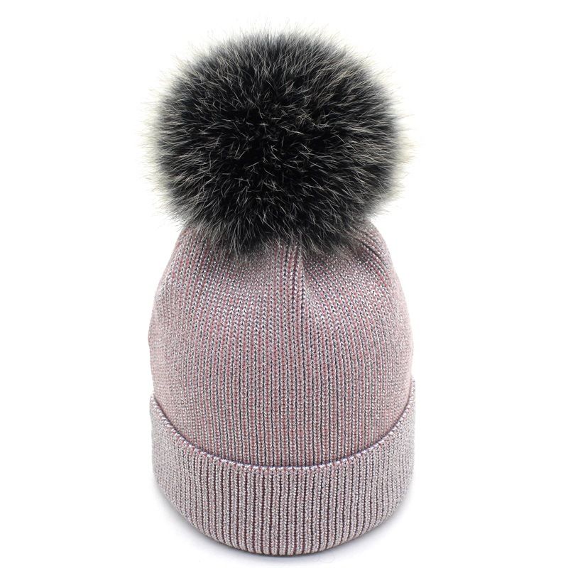 winter hat with fur ball on top