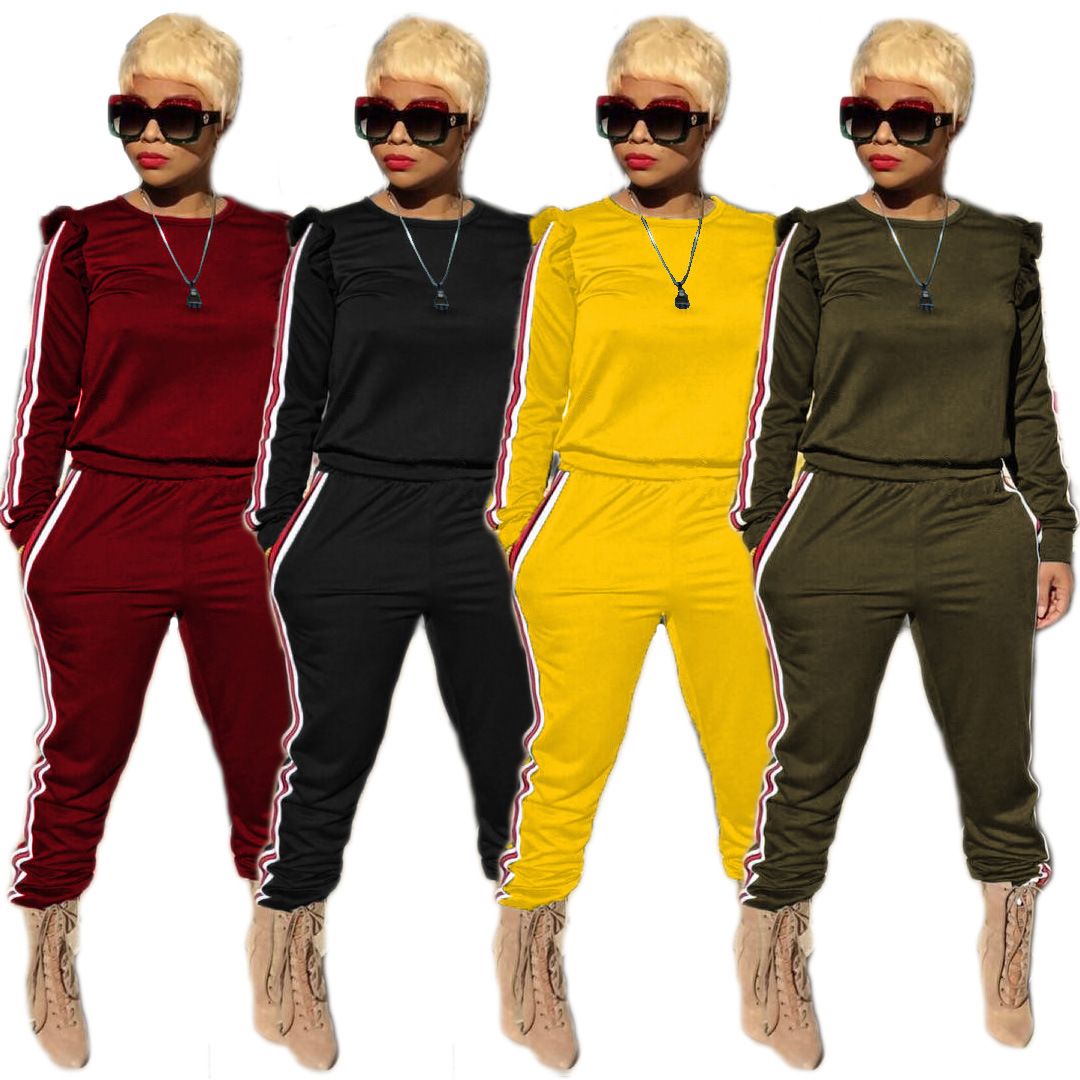 yellow and black jogging suit