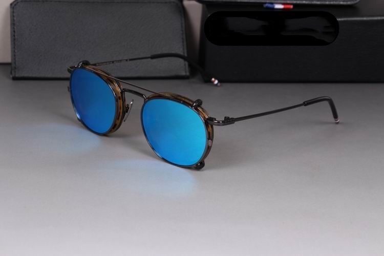 tortoise frame blue lens