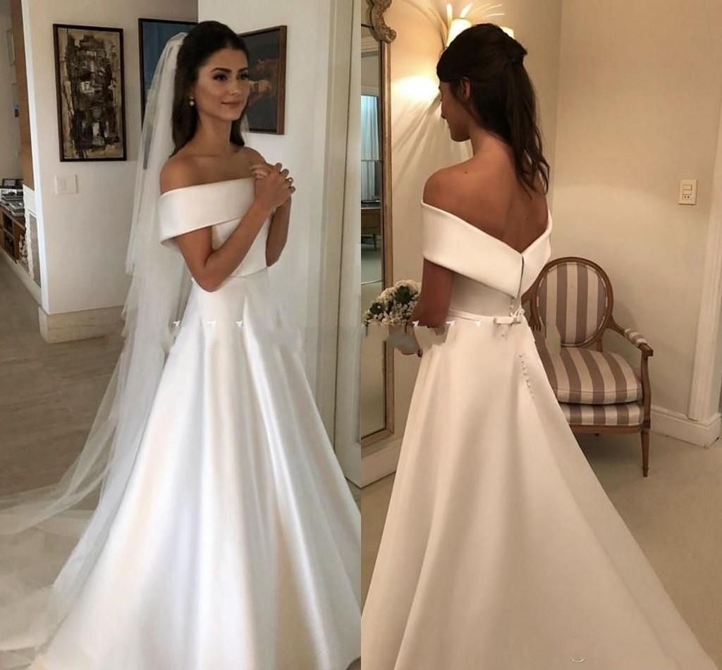 plain white off the shoulder wedding dress