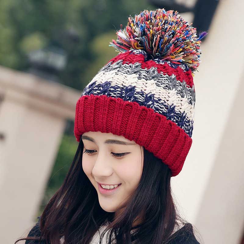 black wooly bobble hat
