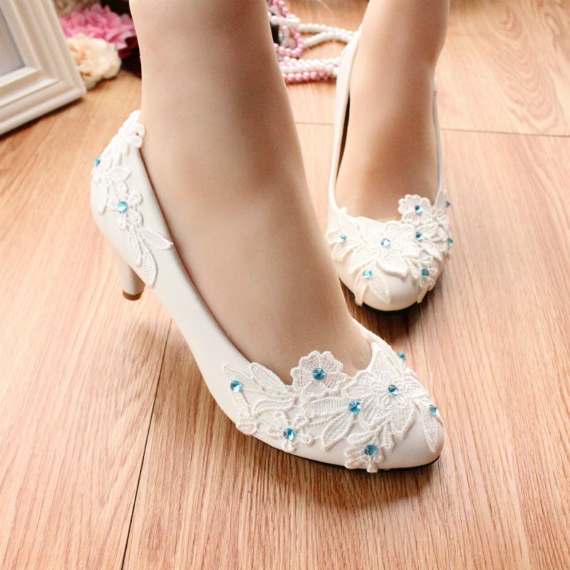 white and blue wedding shoes