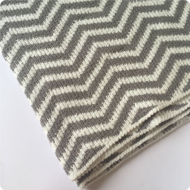 grey and white baby blanket