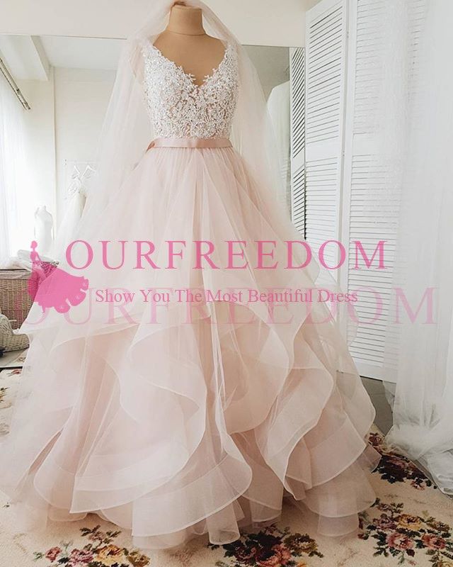 blush pink and white wedding dress