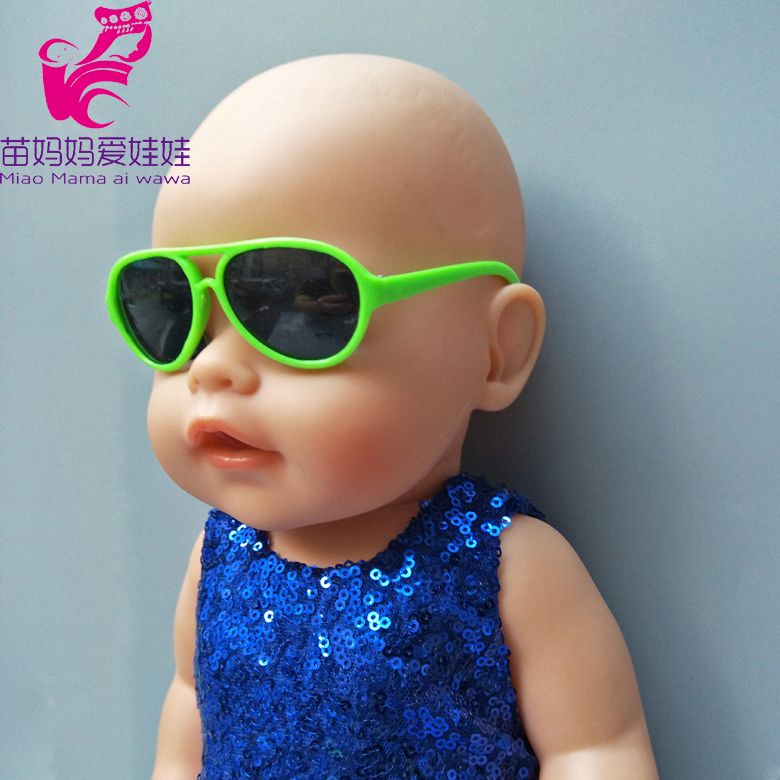 baby doll with glasses