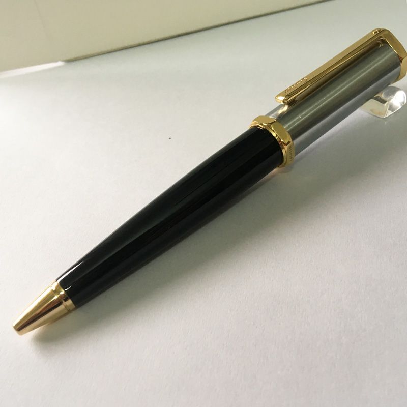 a black golden pen