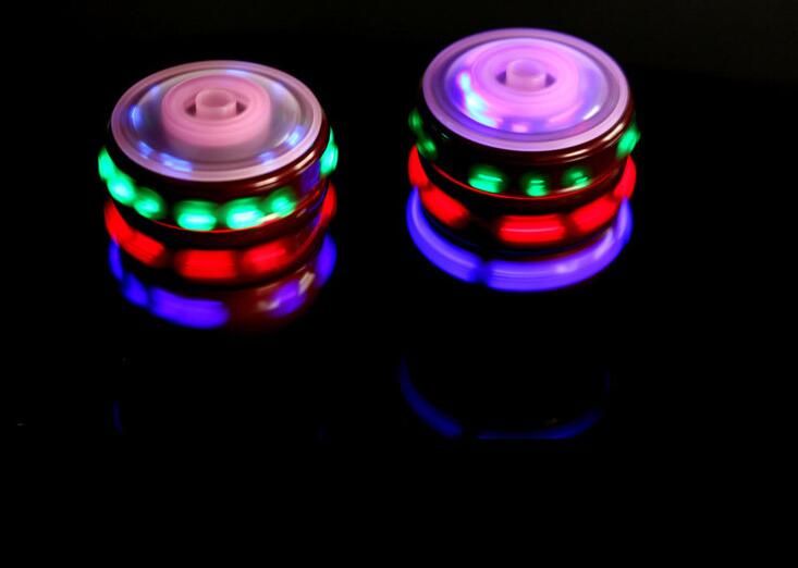 Children Toy plastic Spinning Laser Music Fun Peg Top 