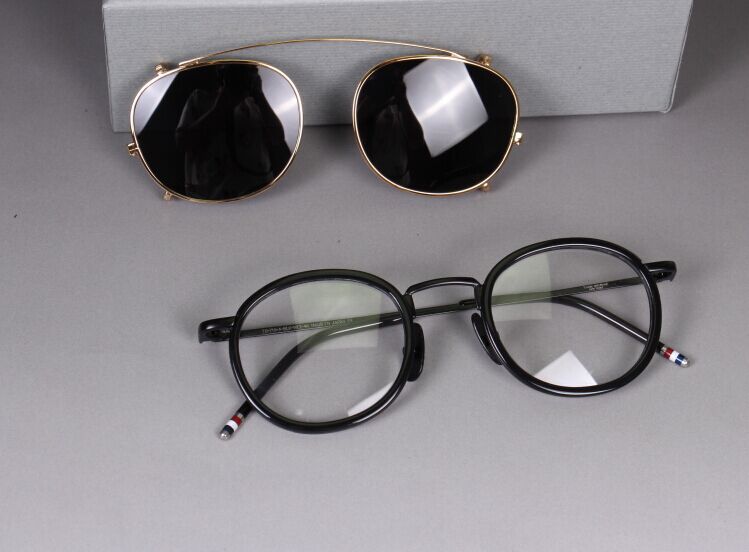 black frame gold gray lens