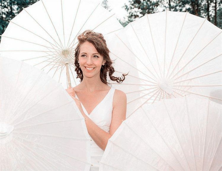 60 white wedding umbrellas