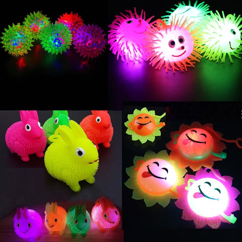 La luz exprime los juguetes antiestrés Rabbit Flash Ball divertidos para niños Juguetes luminosos