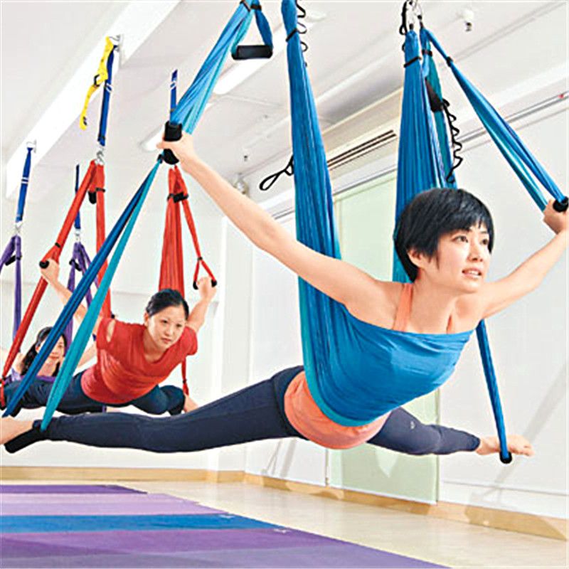 yoga with cloth hanging