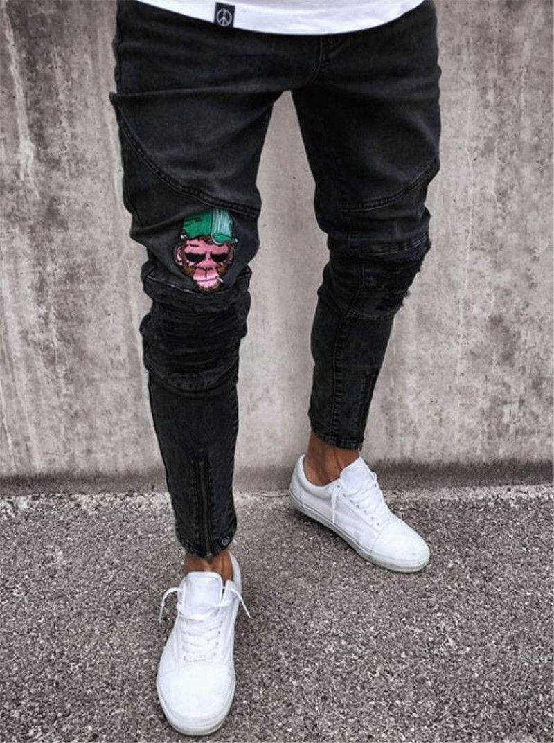 Vaqueros de los hombres elásticos y desgarrados Skinny Biker Jeans Patrón  de dibujos animados destruido Taped