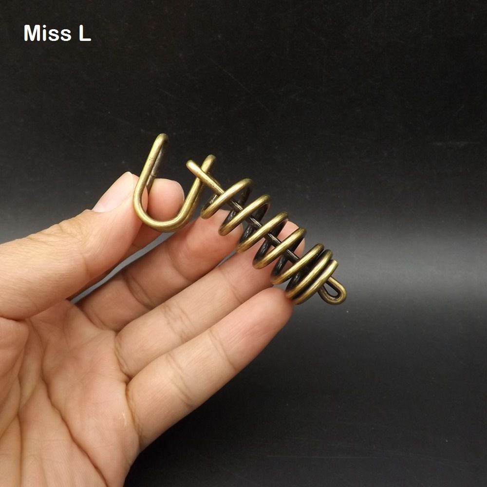 Spring Shape Small Size Brown Color Metal Ring Puzzle Brian Teaser Mind Gadget Intelligence Game Toys For Children From Yongchaofeng 10 05 Dhgate Com