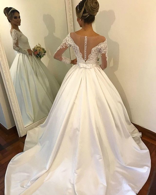 Nuevos botones Ver a través de la espalda Vestidos de novia con lazo Manga larga Apliques Nuevos botones Ver a través de la espalda Vestidos de novia con lazo Manga larga Apliques
