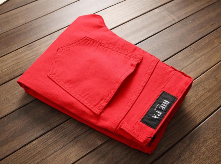 red ripped pants