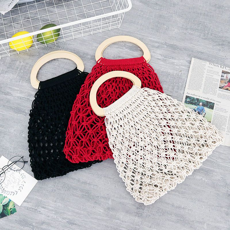 Compra Retro Hecho A Mano Tejido Bolsos De Las Mujeres Bolsas De Ganchillo  Tejer Malla Hueco Bolsa De Playa Red Grande Bolsa De Compras Manija De  Madera Embrague BA609 Barato | Entrega
