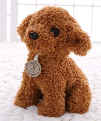 brown and white plush dog