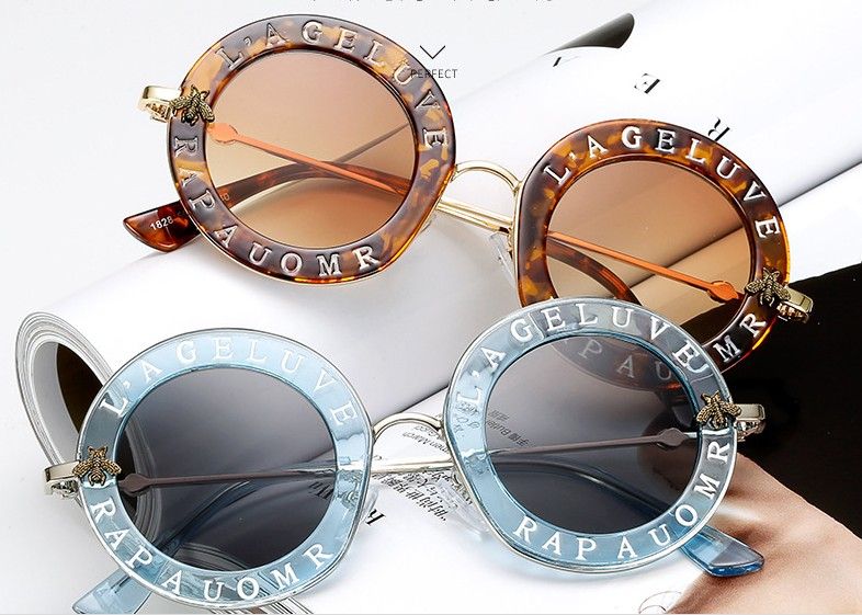 lentes gucci redondos con letras
