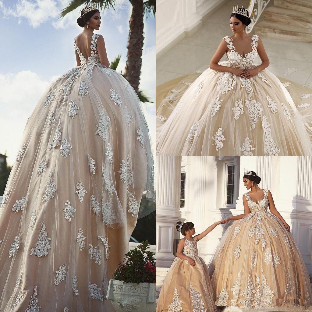 wedding dress matching flower girl