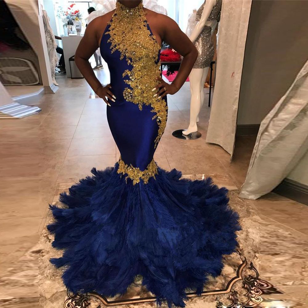 black dress with feathers on bottom