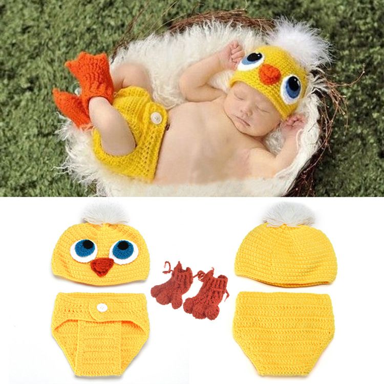 yellow knitted baby outfit