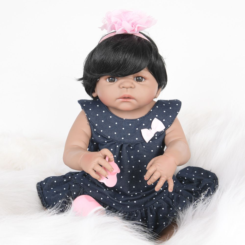 black baby doll with blonde hair