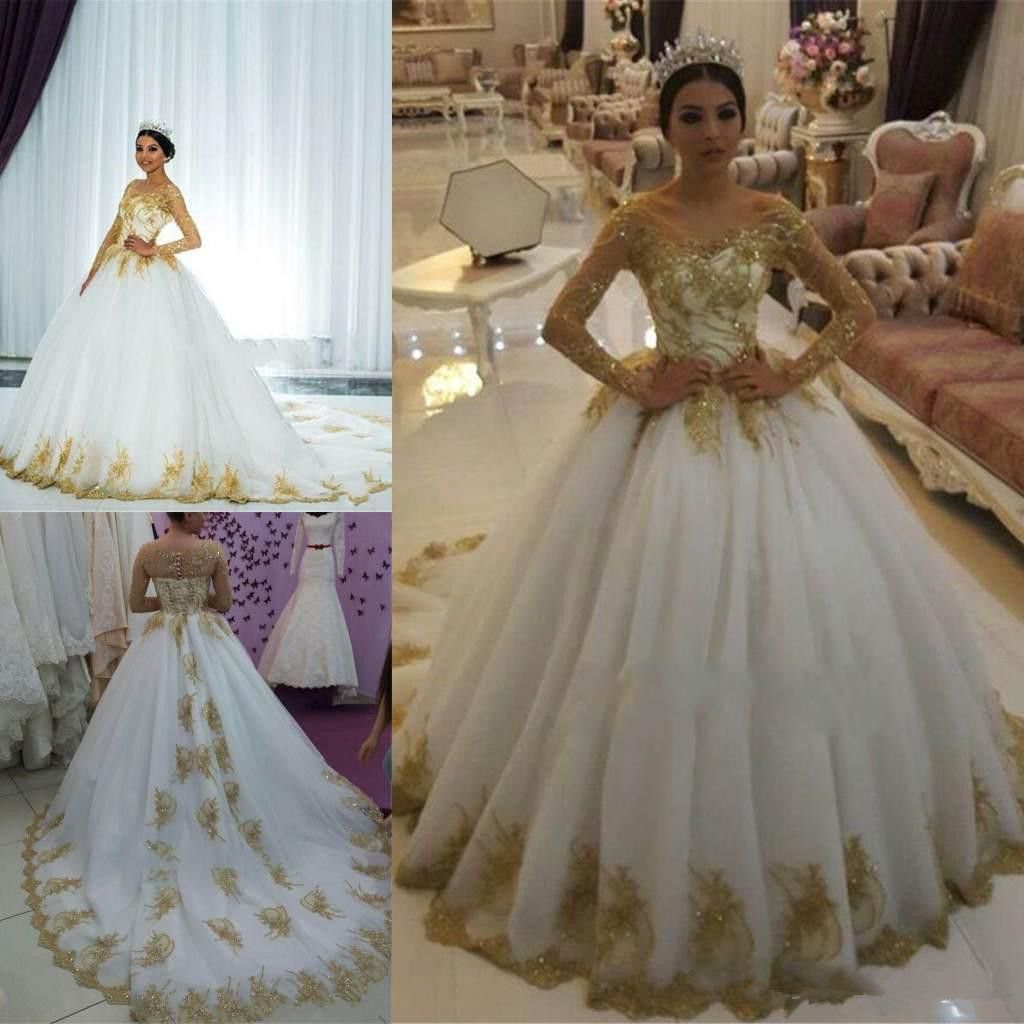 Ejemplo Romper riqueza Vestidos de boda árabes Manga larga aplique de encaje dorado Tul sexy Backless Corte tren Vestidos de novia Vestidos de boda africanos Ejemplo Romper riqueza Vestidos de boda árabes Manga larga aplique de encaje dorado Tul sexy Backless Corte tren Vestidos de novia Vestidos de boda africanos