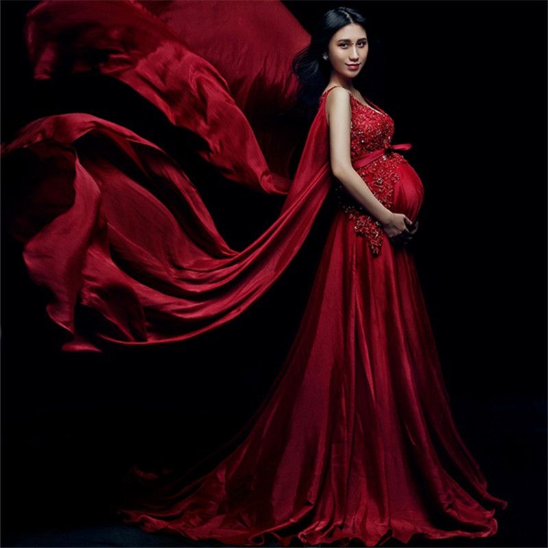 red maternity gown for photoshoot