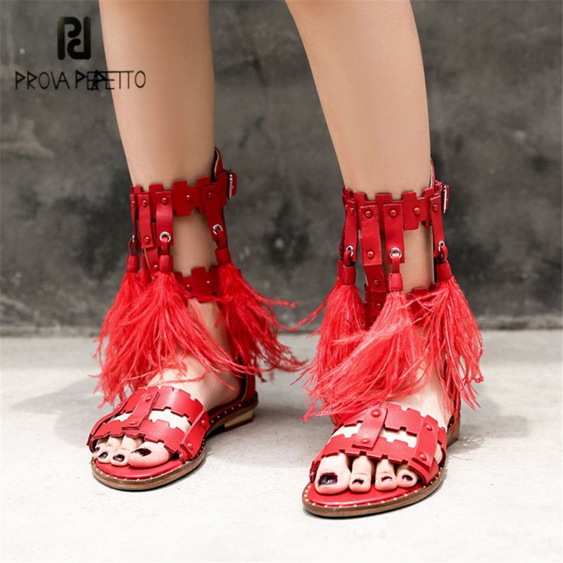 red fringe flat sandals