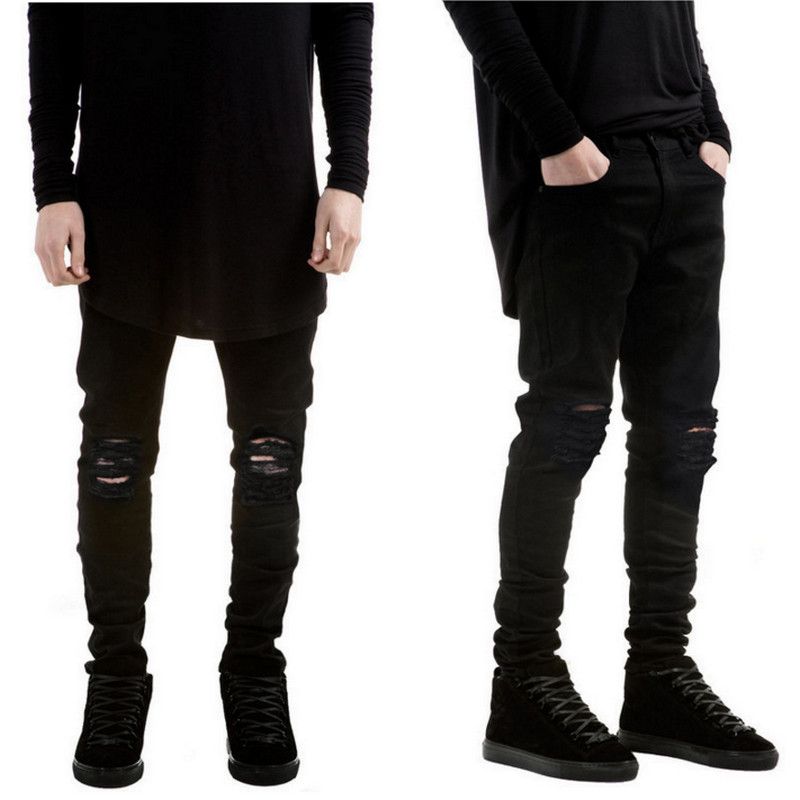 black ripped jeans designer