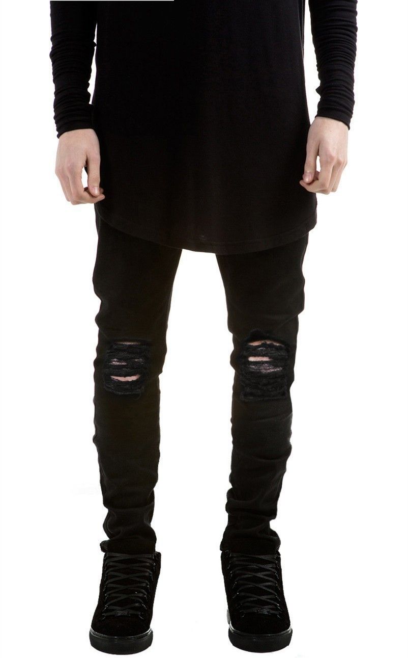 black ripped jeans designer