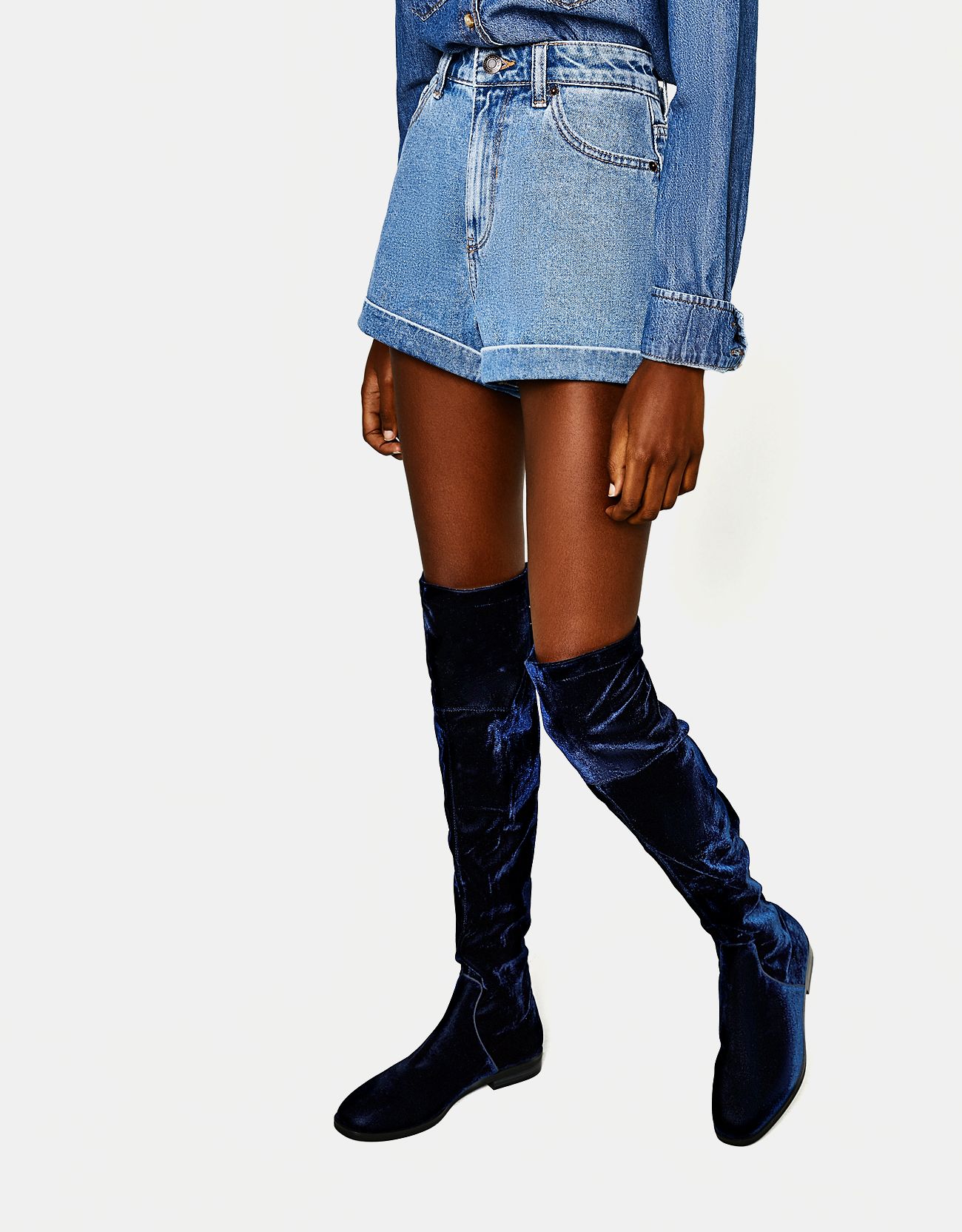 dark blue knee high boots