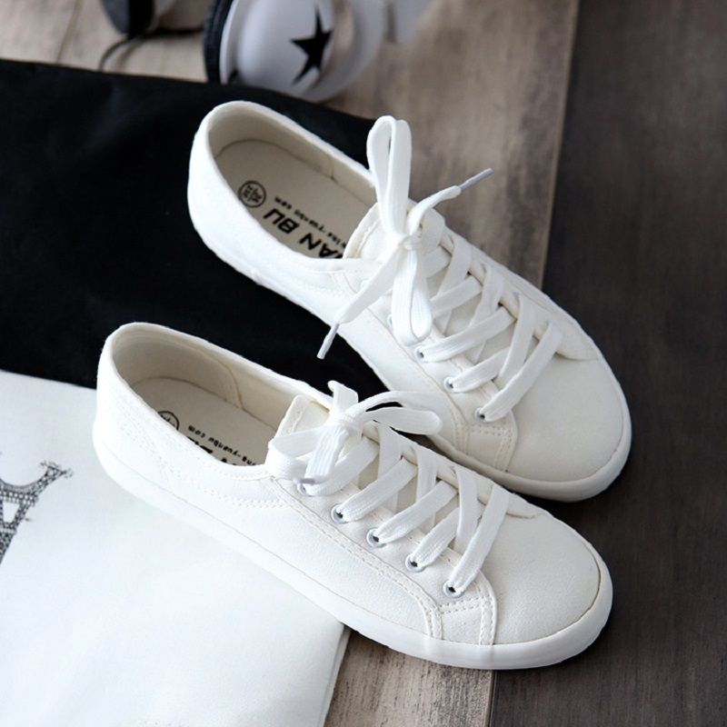 ladies white flat trainers