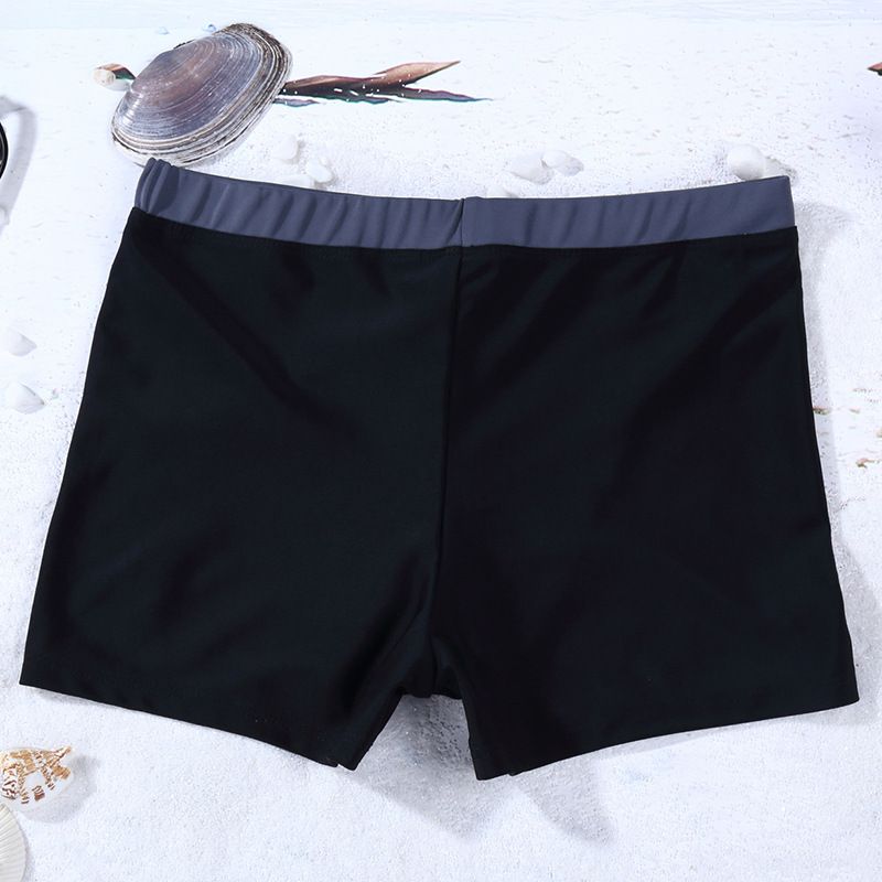 solid black swim trunks