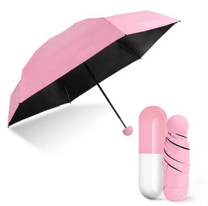 Paraguas de la cápsula Paraguas plegable a prueba de viento Bolsillo transparente Paraguas anti-UV Compacto Lluvia Paraguas de la píldora de los